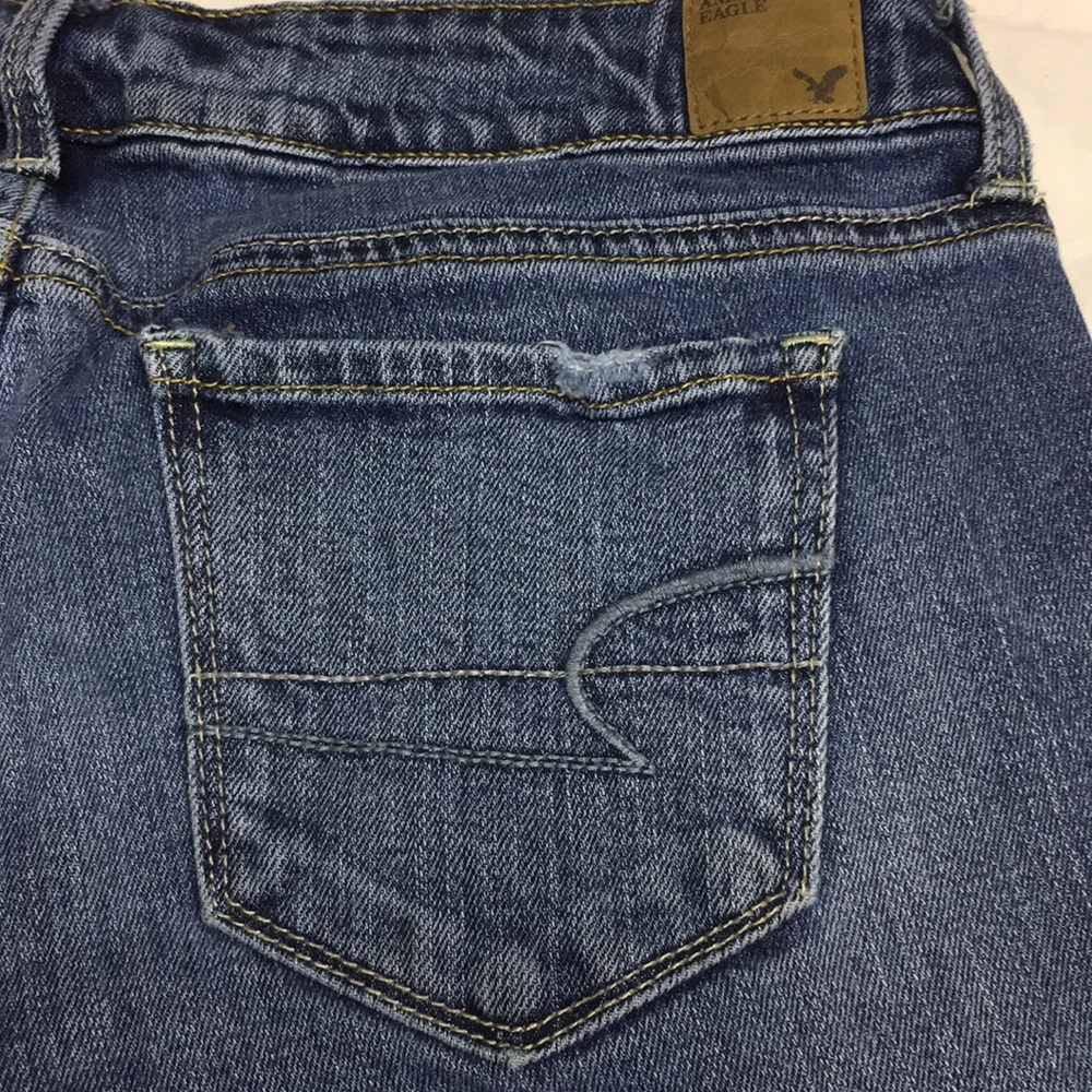 American Eagle super distressed skinny’s